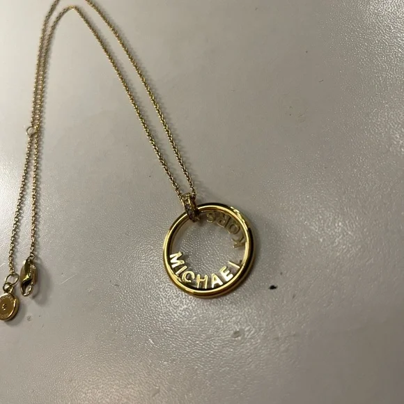 Michael Kors Gold Circular Pendant Necklace - Picture 2 of 3